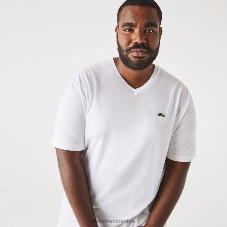 Polo de algodón con cuello en V y corte regular (talla grande) blanco Lacoste ropa hombres 80XZX707