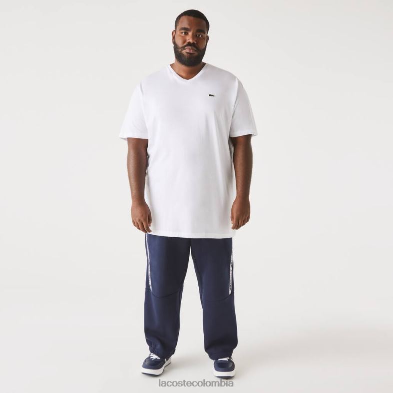 Polo de algodón con cuello en V y corte regular (talla grande) blanco Lacoste ropa hombres 80XZX707