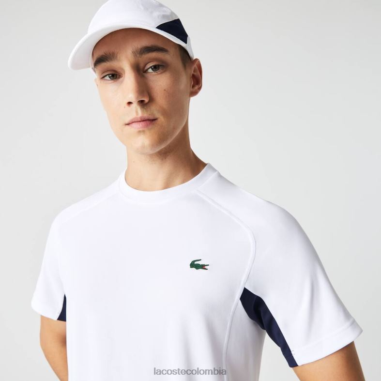 camiseta deportiva de tenis de piqué ultra-dry con bloques de color blanco/azul marino/blanco Lacoste ropa hombres 80XZX583