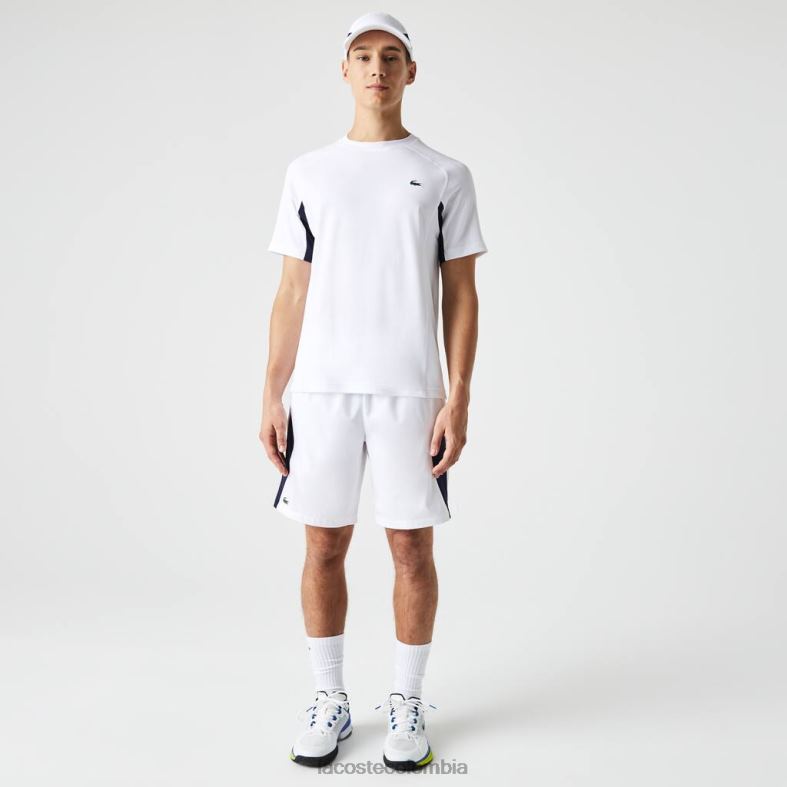 camiseta deportiva de tenis de piqué ultra-dry con bloques de color blanco/azul marino/blanco Lacoste ropa hombres 80XZX583