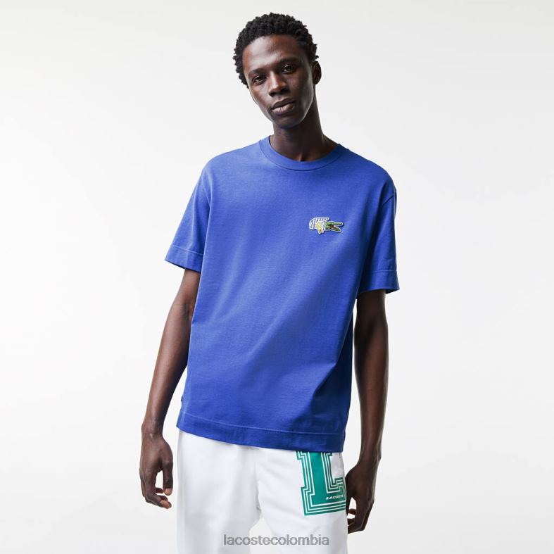 camiseta holgada con insignia y efecto cómic azul Lacoste ropa hombres 80XZX742