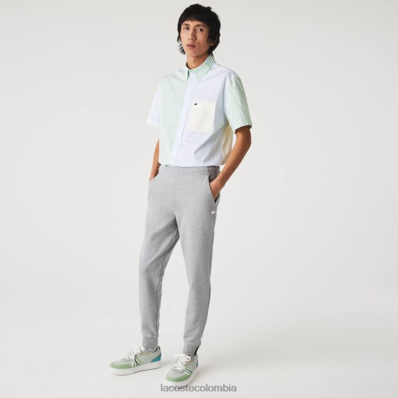 pantalones de chándal de corte slim en mezcla de algodón jaspeado lomo gris Lacoste ropa hombres 80XZX1005