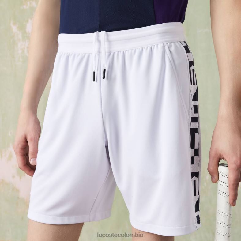 shorts deportivos de tenis con estampado en contraste blanco Lacoste ropa hombres 80XZX1536