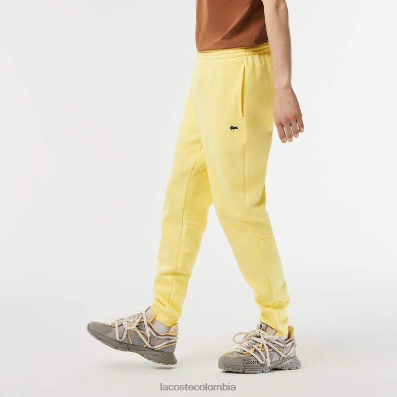 pantalones de chándal con corte tapered amarillo Lacoste ropa hombres 80XZX349