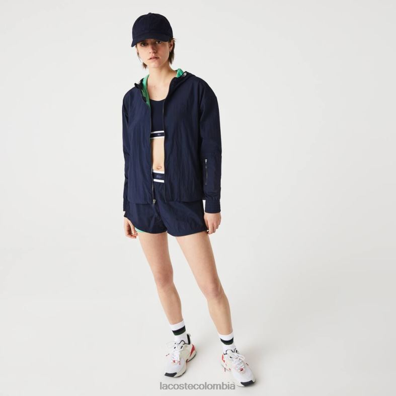 Chaqueta deportiva ligera de nailon y malla con cremallera. azul marino/verde Lacoste ropa mujer 80XZX2633