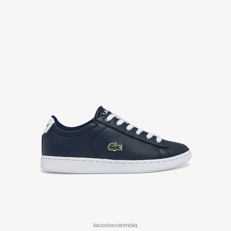 zapatillas carnaby sintéticas en contraste de color azul marino y blanco Lacoste zapatos niños 80XZX3256