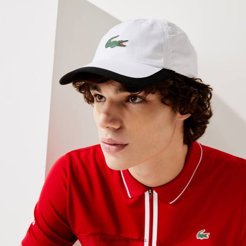 gorra deportiva liviana con borde en contraste blanco negro Lacoste accesorios unisexo 80XZX1930