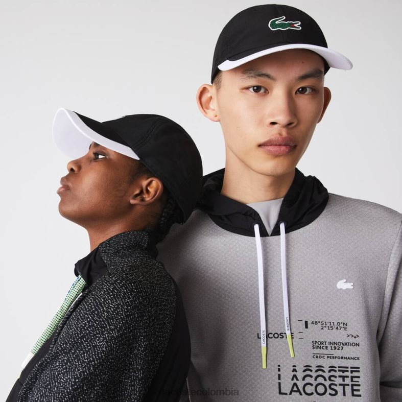 gorra deportiva liviana con borde en contraste blanco negro Lacoste accesorios unisexo 80XZX1931